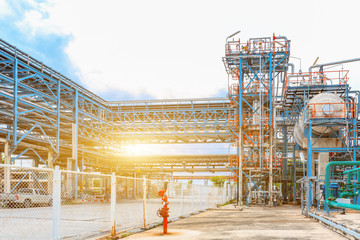 Petrochemical oil refinery, Refinery oil and gas industry, The equipment of oil refining, Close-up of Pipelines and petrochemical industrial plant towers view of oil and gas refinery