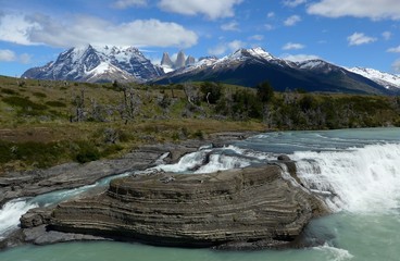 Mountains and waterfalls in the Torres del Paine District of Patagonia.