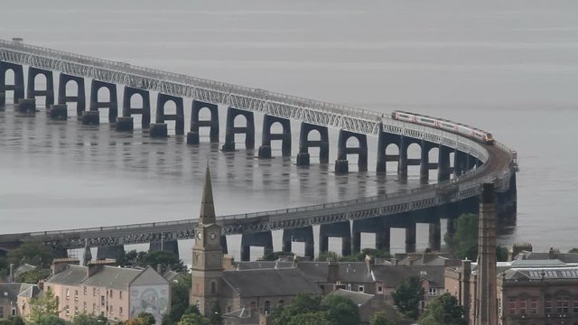 Elevated view of Train crossing Tay Rail Bridge Dundee Scotland