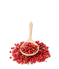 Pepper red peppercorns in wooden spoon.