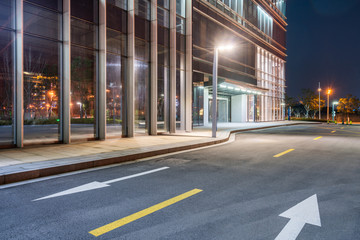 empty asphalt road along modern business buildings in city of China.