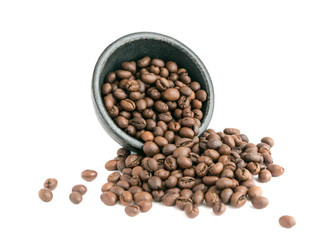 Roasted Coffee Beans Scattered out of the Black Bowl Isolated