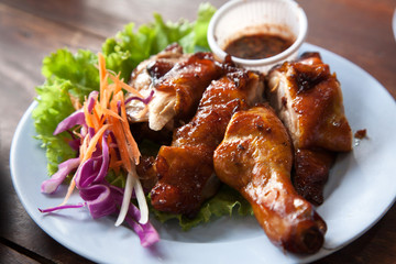 Thai local food grilled chicken with spicy sauce top view