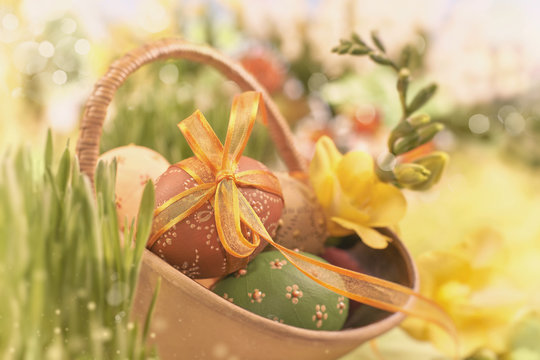 Easter background with eggs and spring flowers