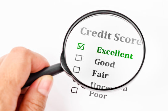 Credit score form with magnifier glass.