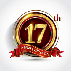 17th anniversary logo with ring and ribbon golden colored isolated on white background, vector design for greeting card and invitation card.