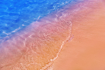 Famous pink sand beach Elafonisi, Crete, Greece. Beautiful seashore and blue sea. - obrazy, fototapety, plakaty