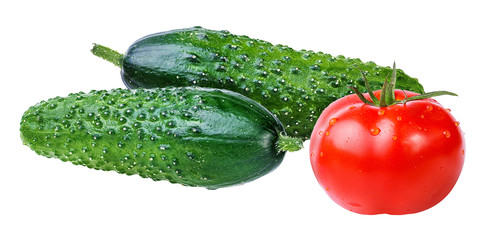 Fresh vegetables (tomato and cucumber ) isolated on white