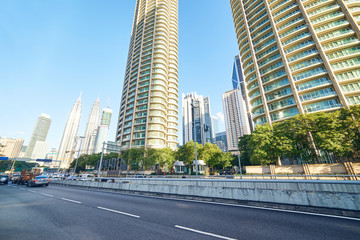 Asphalt road and modern buildings in Kuala Lumpur,Malaysia.