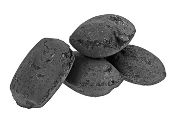 Charcoal briquettes on white background