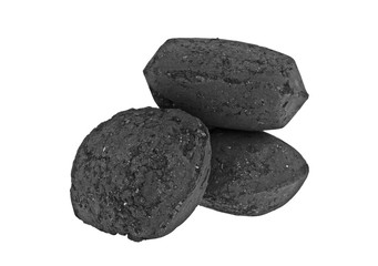 Charcoal briquettes on white background