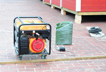 Standby Generator - Outdoor Power Equipment. Mobile Backup Generator on the construction site. Diesel Generator.