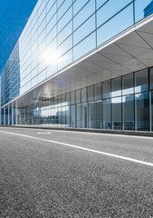 empty asphalt road along modern business buildings in city of China.