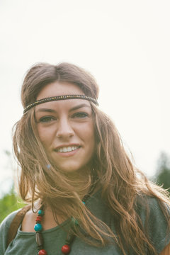 Smiling girl in hippie style