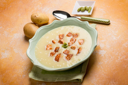 potatoes soup with roasted salmon and wasabi