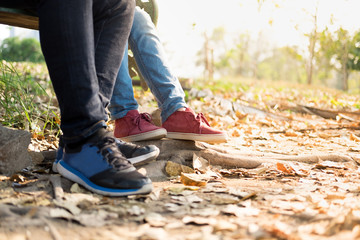 focus woman wearing  red shoes with blue jean