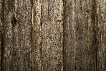 Naklejka premium Old shabby rough dark wooden background. Wood texture 