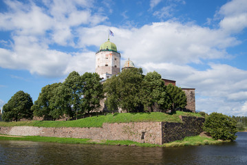 Fototapeta na wymiar St. Olaf's Tower in the Vyborg castle, sunny August day. Vyborg, Russia