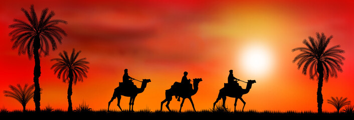 Fototapeta na wymiar Caravan of camels at sunset