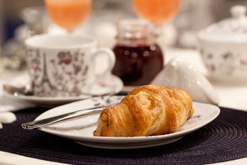 fresh croissant on a serving table for breakfast