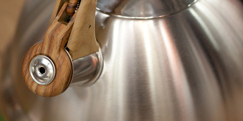 metallic kettle with  whistling for boiling control