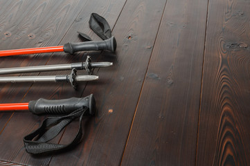 trekking pole on the wooden background