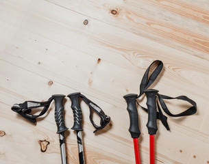 trekking pole on the wooden background