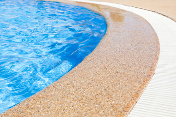 swimming pool edge with drainage ditch