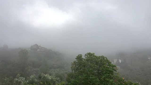 Fog in valey Tuscany timelapse 4K