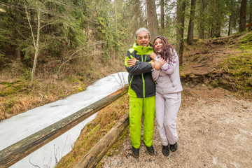happy couple on vacation flirting in Dolomites mountains
