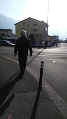 Old man walking on a street