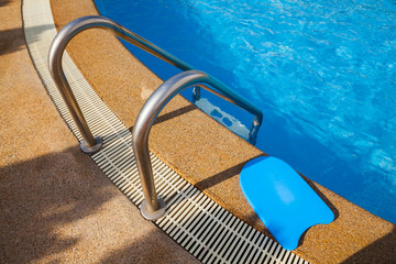 stair on the edge of swimming pool