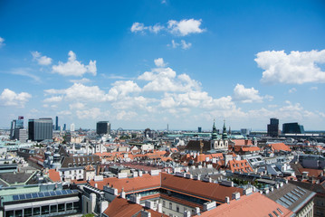 VIENNA, AUSTRIA - JULY 29, 2016: Panoramic view to Vienna city center from St. Stephen's Cathedral tower on summer sunny day.