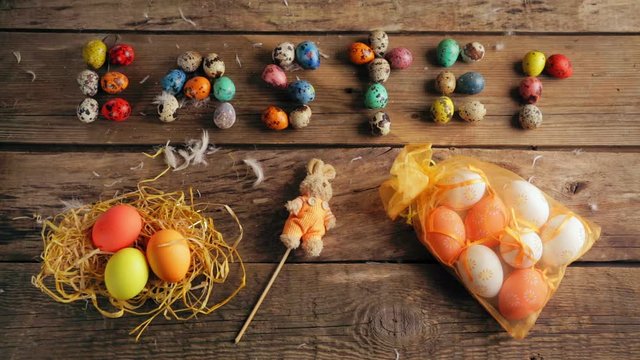 Composition from eggs and a toy rabbit