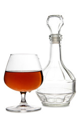 Glass with brandy and cognac on white background