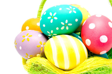 Perfect colorful handmade easter eggs in the basket