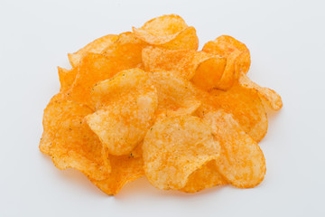 Crisps with paprica on a white background.