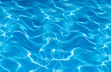 beautiful clear pool water reflecting in the sun background