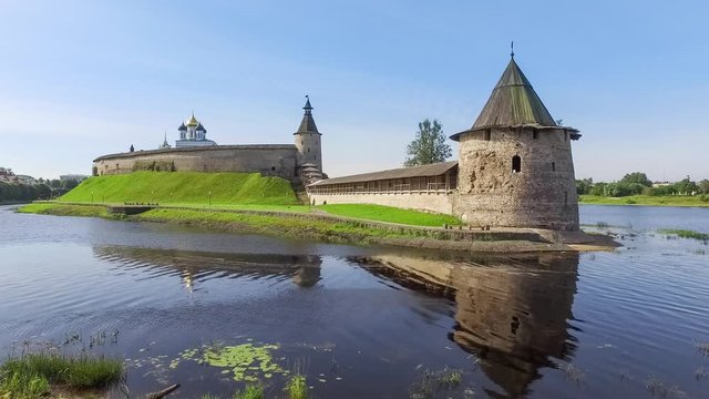 Static view on Ploskaya tower and Pskov Kremlin from side of river Pskova in Pskov, Russia
