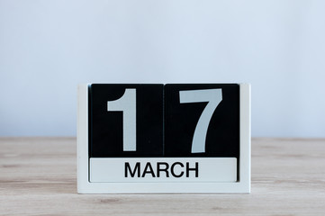 Happy St Patricks Days save the date. March 17th. Day 17 of month, everyday calendar on wooden table background. Spring time, empty space for text