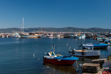 Fototapeta premium Picturesque boats in the port of Nessebar, Bulgaria.