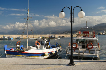 Fishing boats in the port of Greece in the background afternoon