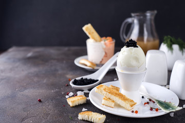 delicious breakfast with boiled eggs and crispy toasts