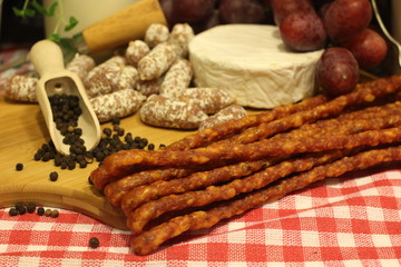 cheeseboard and sausageboard, pepper, sausage, country. county life, country food, herbs, oregano, milk,  grapes, lavender