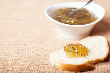 Gooseberry jam on white bread