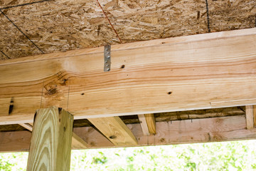 roof rafter and ceiling joist with blue sky background