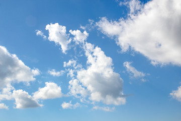 Naklejka na ściany i meble Blue sky, white clouds, natural abstract background.