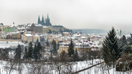 Obraz premium Prague Castle in Winter, Snow Covered Cityscape