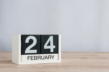 February 24th. Day 24 of month, everyday calendar on wooden table background. Winter concept. Empty space for text