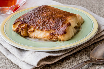 Turkish Dessert Kazandibi / milk baked pudding with tea